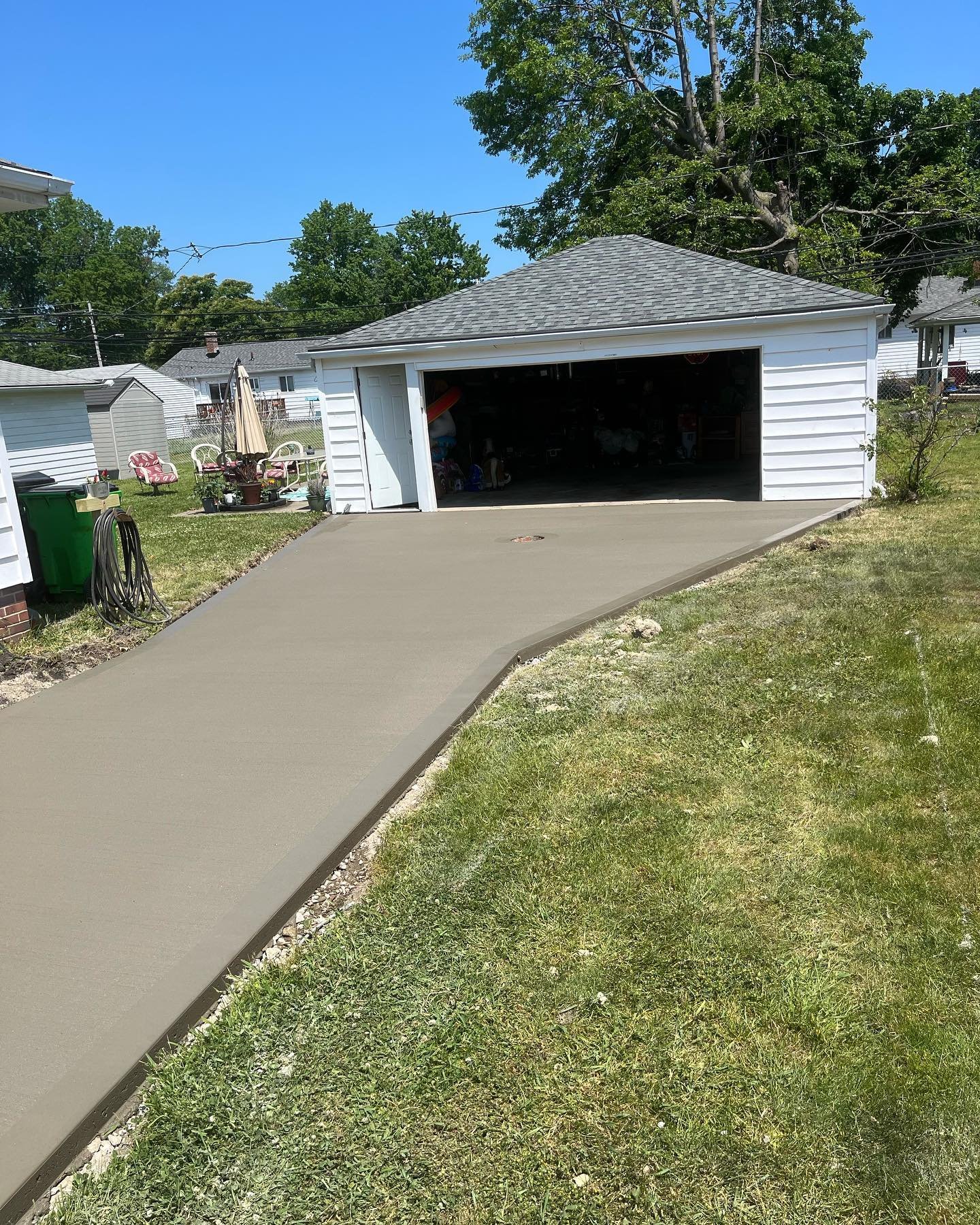 Xpress Construction & Services delivers quality concrete driveways and lawn care for welcoming, well-kept homes.