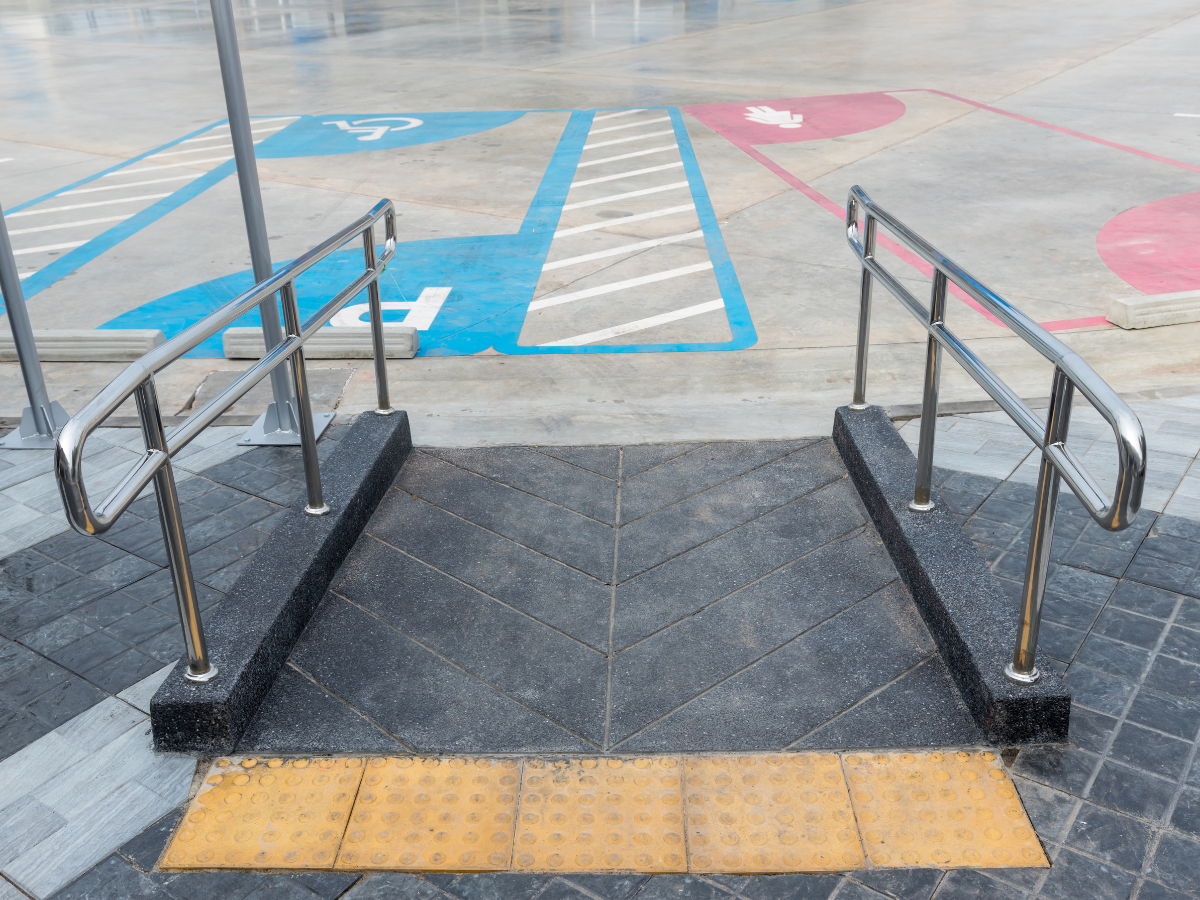 Xpress Construction & Services shows a safe, easy entrance from ramp to parking with clear access features for all users.